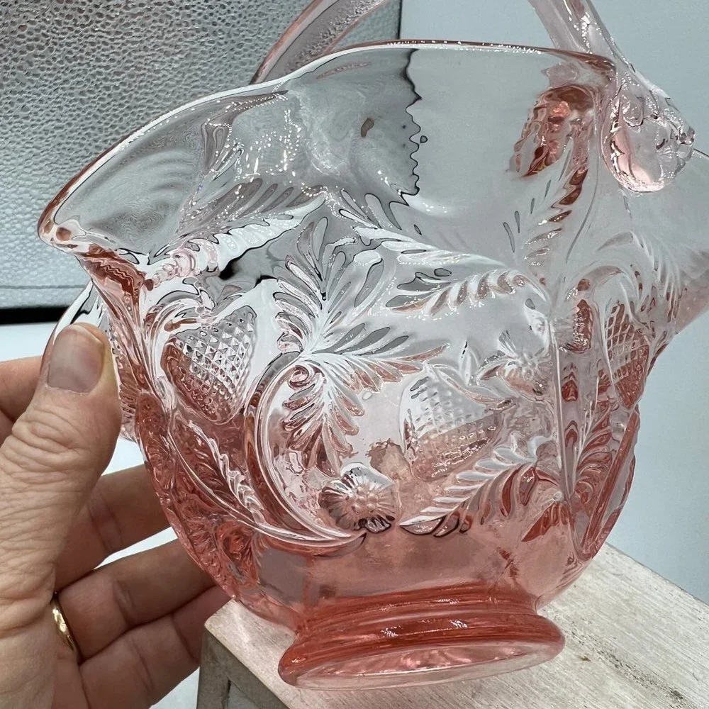 Dusty Rose by Fenton. Thin ruffled edges, rose pattern with applied handle.